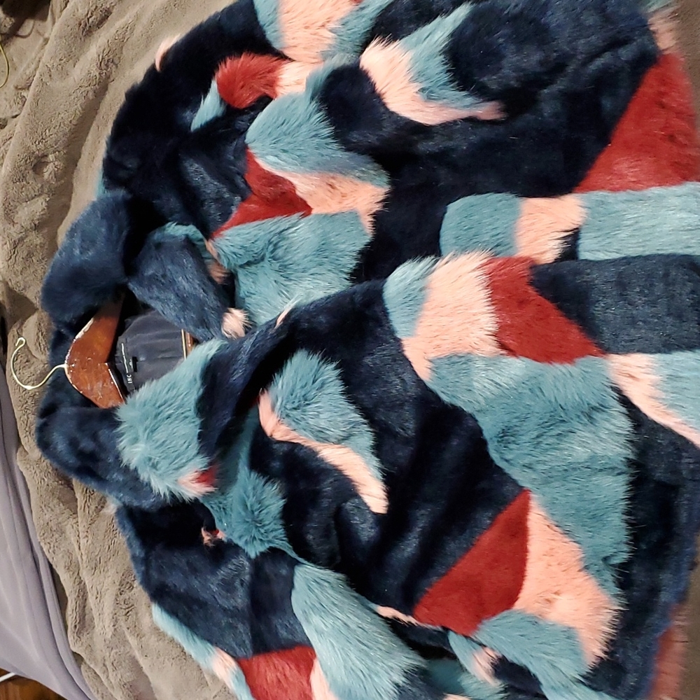 Beautiful and colorful multi colored faux fur coat.